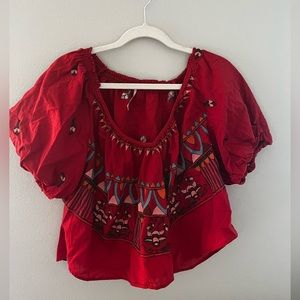 Free People size small can be worn on or off shoulder